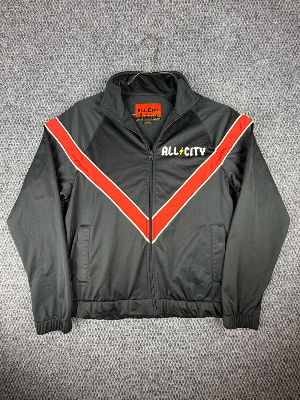 All City By Just Don Full Zip Track Jacket, Black With Bold Red Chevron. Size M